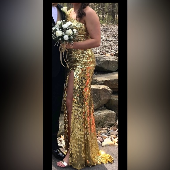 Sherri Hill No. 54987: Gold one shoulder sequin gown with high slit skirt. - Picture 1 of 4